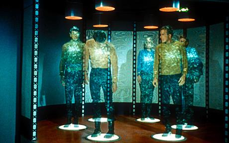 Image 7: In Star Trek, crew members of the USS Enterprise stand on transporter platforms to be beamed down to a nearby planet. Image 7: In Star Trek, crew members of the USS Enterprise stand on transporter platforms to be beamed down to a nearby planet.